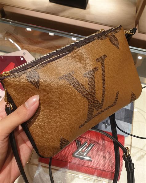 lv double zip pochette price